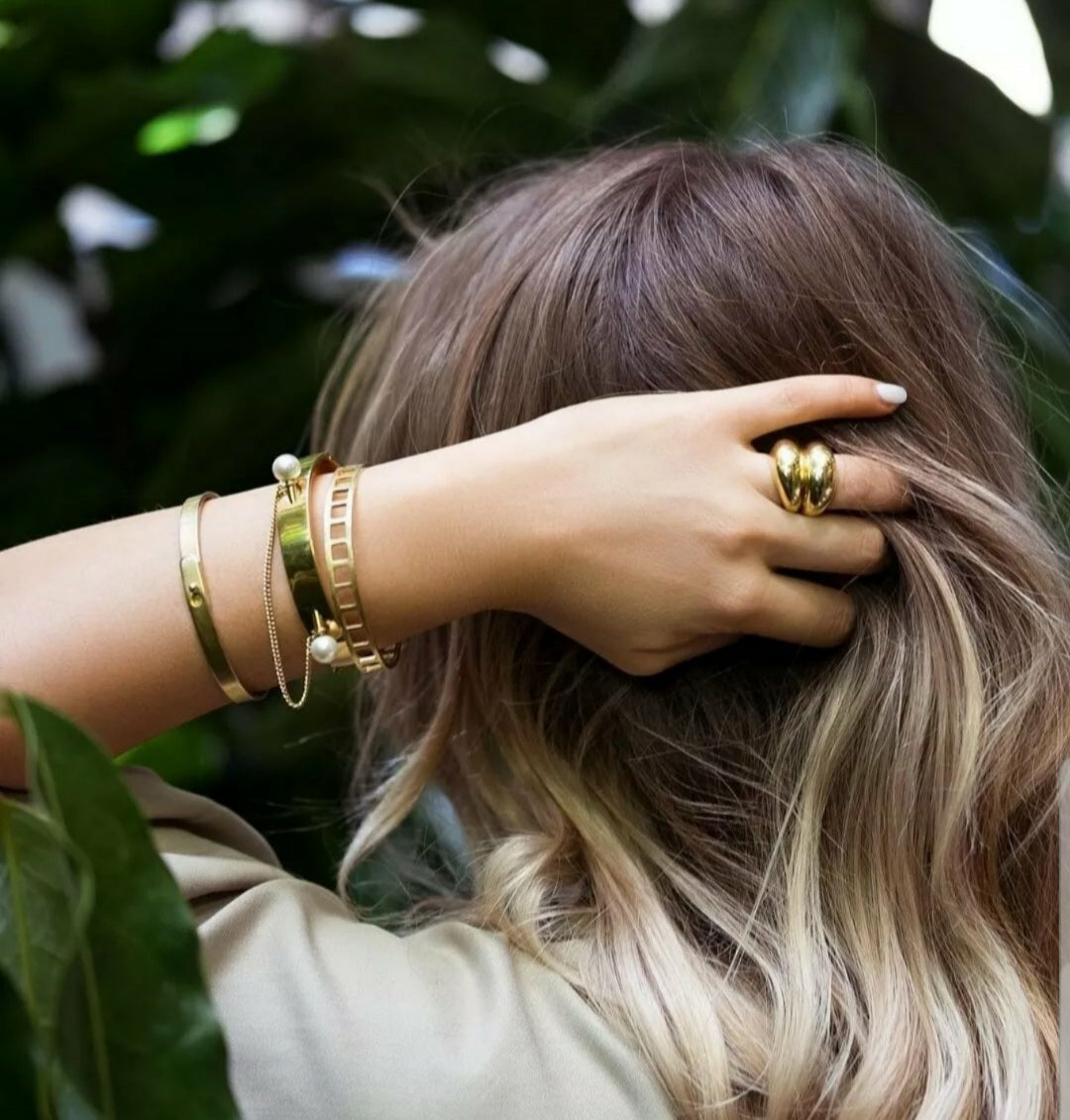 Gold chunky egg style statement ring